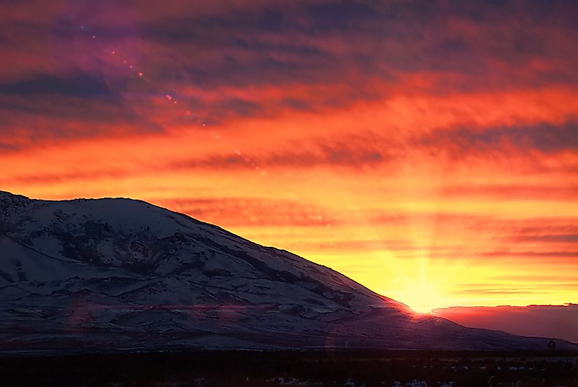 Snowy mountain sunset near Winnemucca, Nevada.