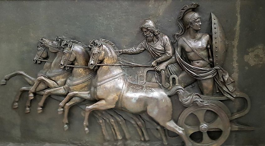 Metallic panel on Corfu Island, Greece, depicting Achilles in his chariot during the Trojan War.