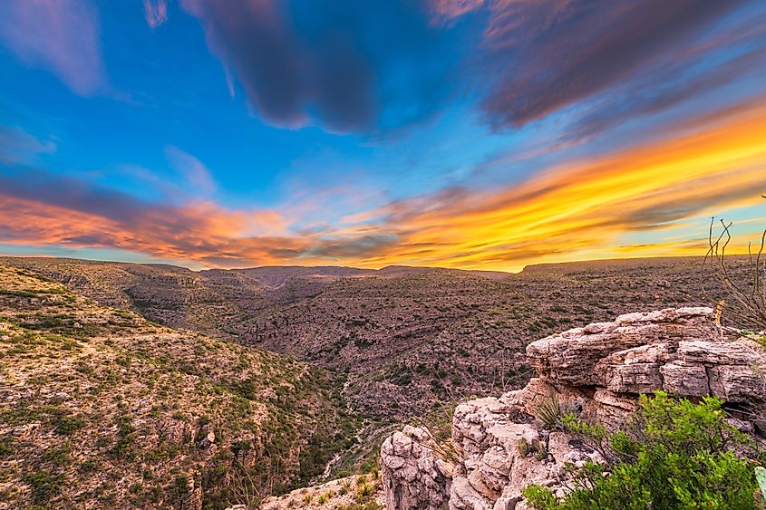 A view of Carlsbad Cavern National Park in New Mexico, overlooking Rattlesnake Canyon just after sunset.