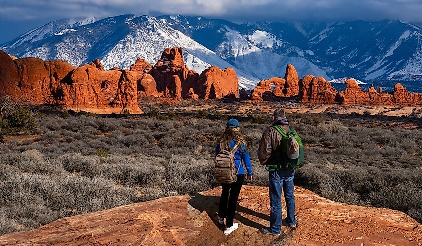 The Windows Section of the park, snow covered La Sal Mountains in the background. Arches National Park ,Moab, Utah,