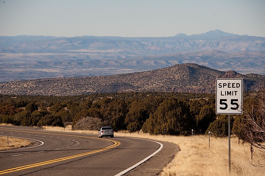 AZ-260, also known as the Zane Grey Highway, looking west toward Camp Verde, Arizona, with a mountain peak on the right