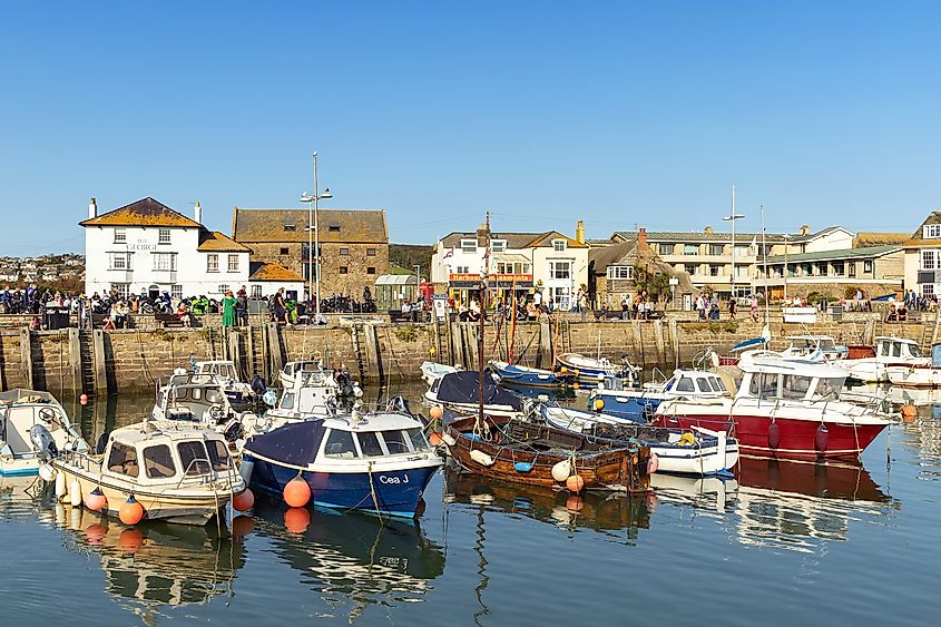 The busy Bridport Harbour in West Bay, Dorset, United Kingdom (Editorial credit: Jackie Matthews / Shutterstock.com)