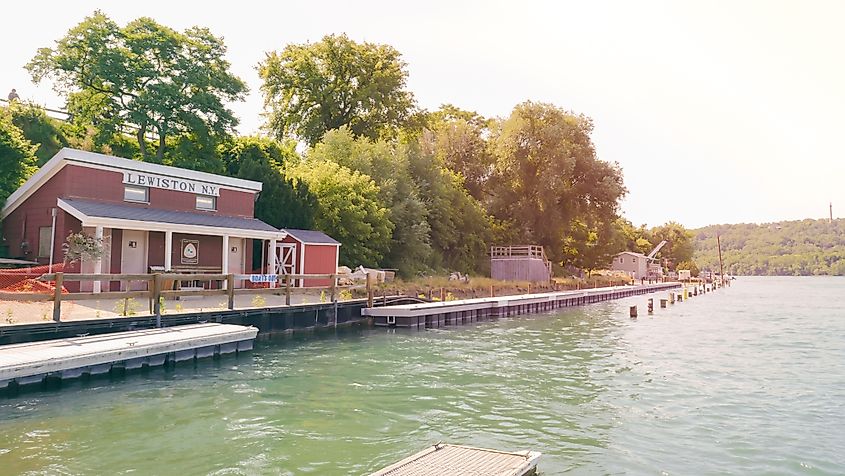 Lewiston, New York as seen from the dock on the Niagara River, with Queenston, Ontario, Canada in the background, via Atomazul / Shutterstock.com