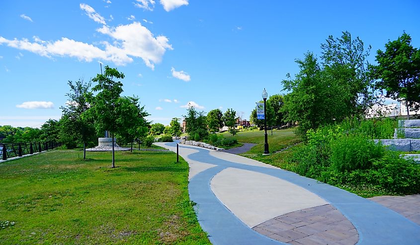 Waterville downtown landscape with path leading to lush park