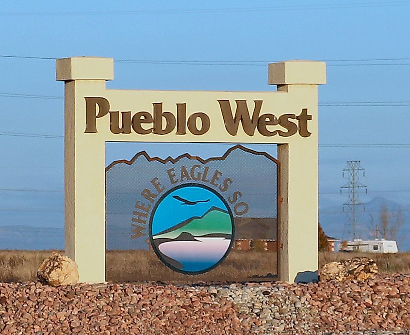 A sign for Pueblo West, Colorado, located along U.S. Highway 50 east of the town.