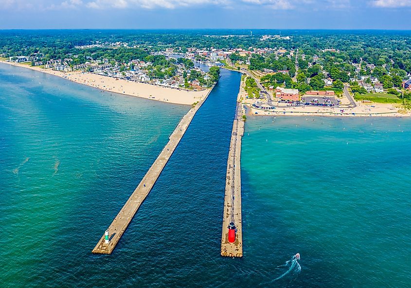 Aerial view of the South Haven Lighthouse jutting out into Lake Michigan.