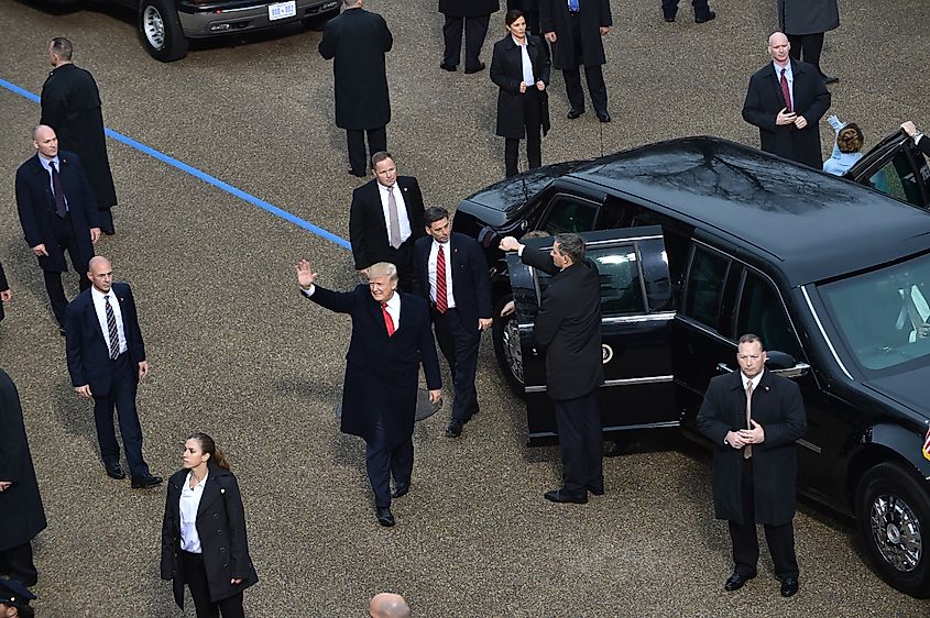 Pictured here in 2017 escorting former President Trump, the Secret Service are responsible for handling many tasks that US Officials cannot do alone. Image via Public Domain.