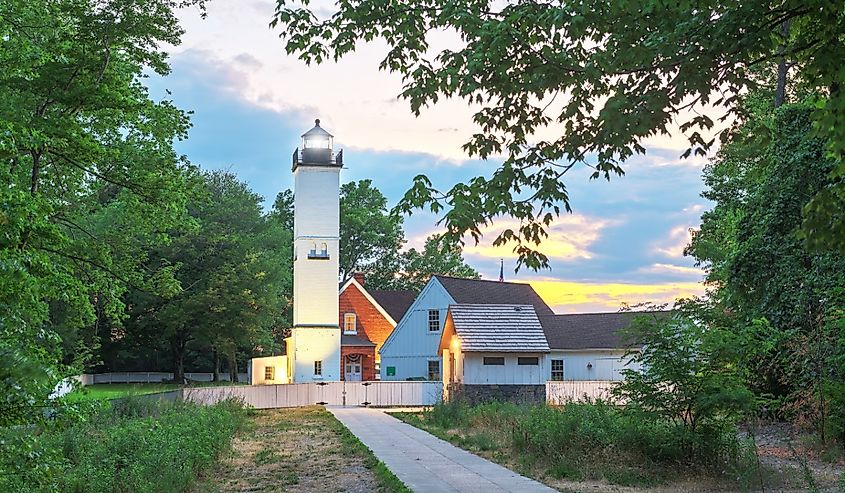 Presque Isle Lighthouse in Erie, Pennsylvania, at dusk.