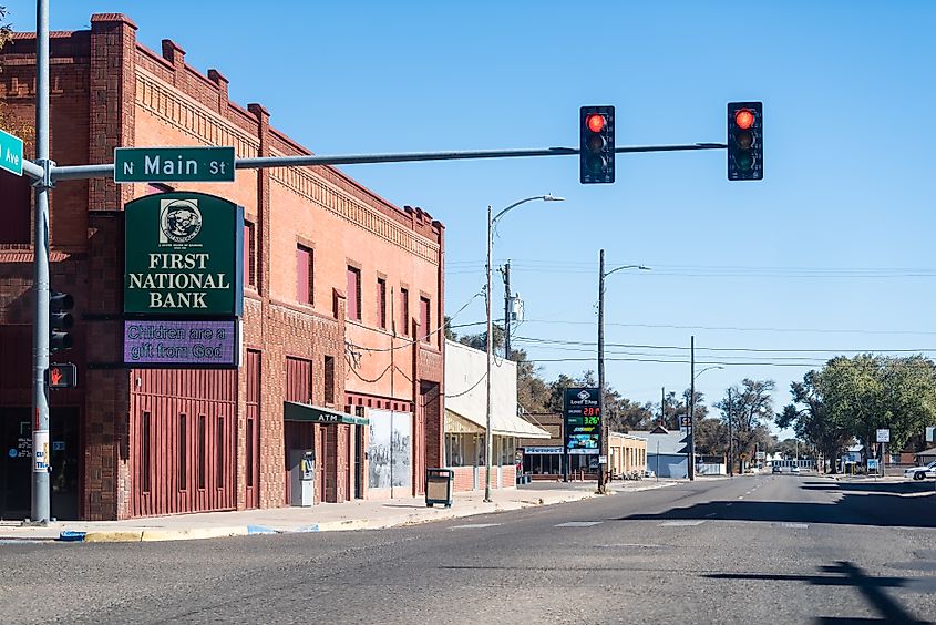 Rocky Ford, Colorado, downtown with a traffic light on Main Street and the historic First National Bank building in view.