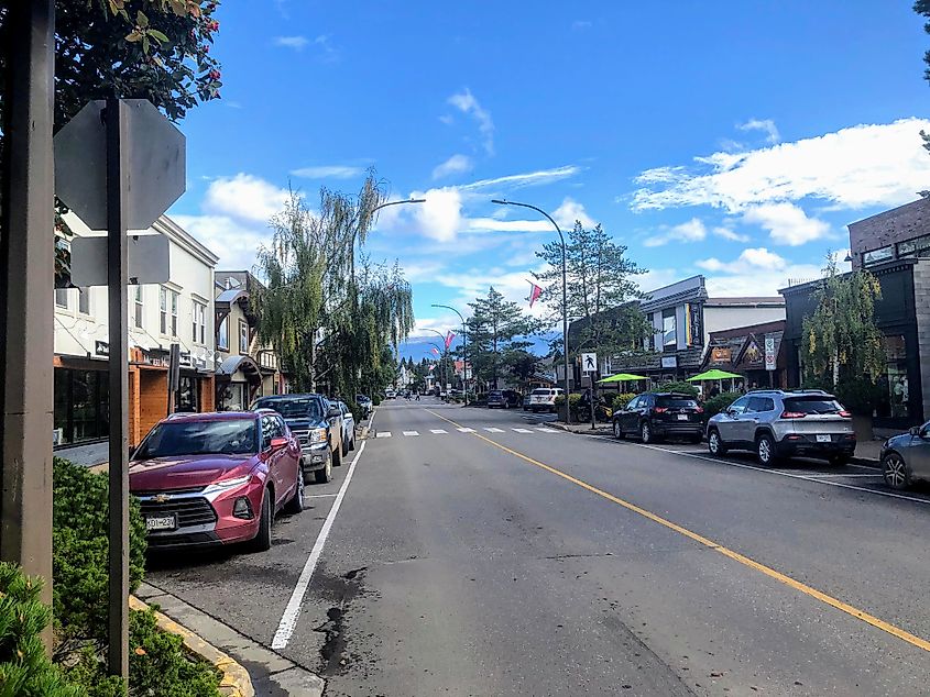 A view looking down a street downtown with shops and restaurants in Smithers, British Columbia Editorial credit: christopher babcock / Shutterstock.com