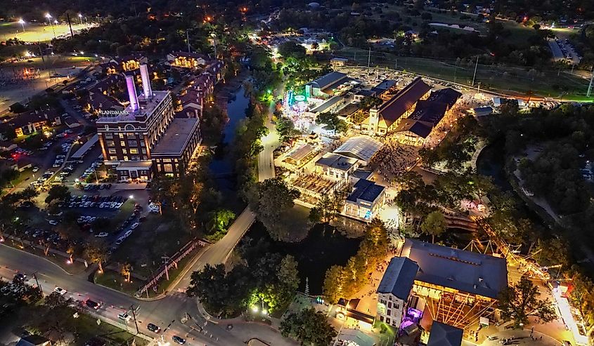 An aerial night view of the city of Wurstfest, New Braunfels, United States.