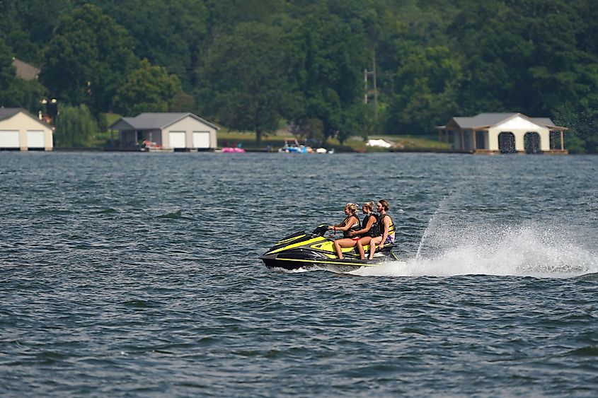 People jetskiing in Lake Guntersville, Alabama.