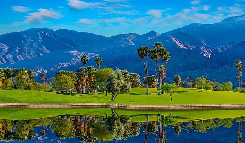 Palm Springs, a city in the Sonoran Desert of southern California, is known for its hot springs, stylish hotels, golf courses and spas. Palm trees and green belts create beauty and a dramatic view.