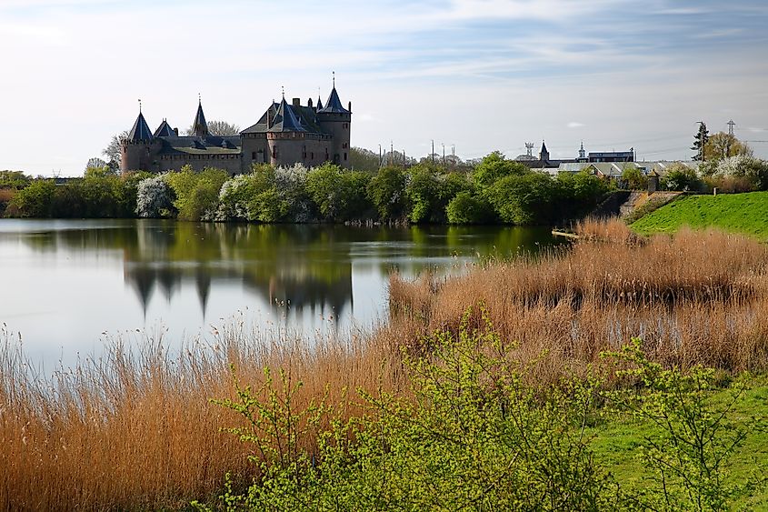 Reflections of Muiderslot Castle, a medieval castle located in Muiden, Amsterdam, Netherlands