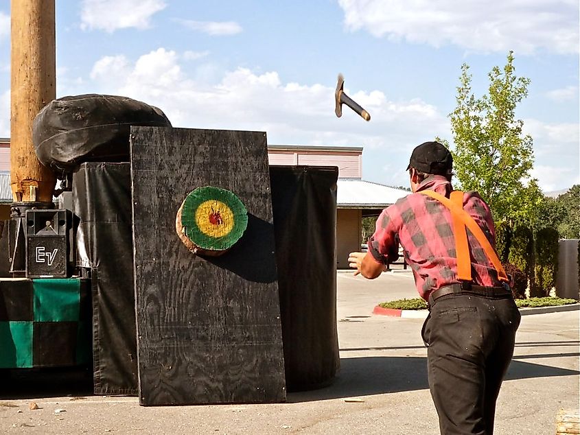 A lumberjack in an axe-throwing event 