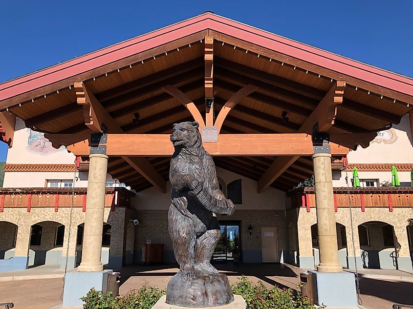 Front view entrance and bear sculpture of Zermatt Utah Resort and Spa.