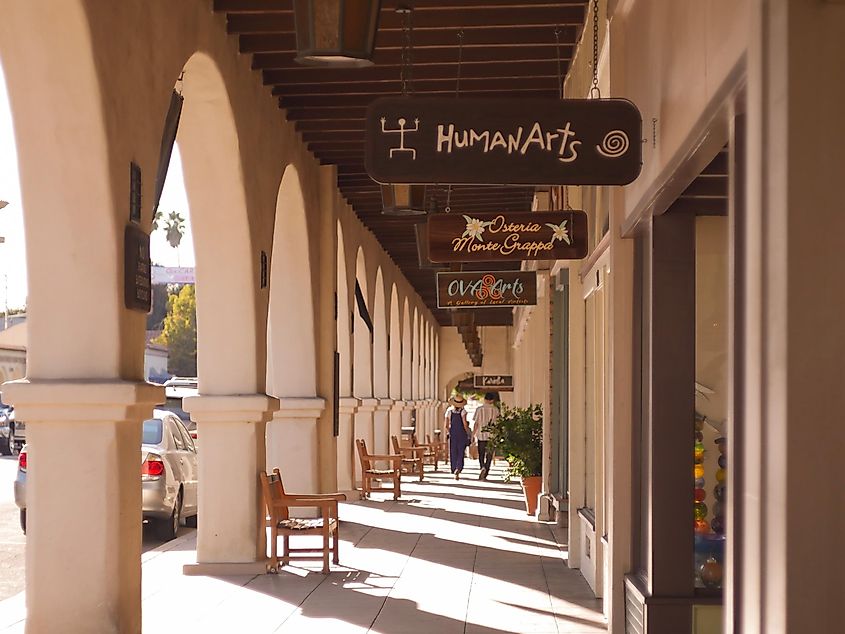 Store fronts with tourist checking out the different spots in Ojai, California, via J Marquez / Shutterstock.com