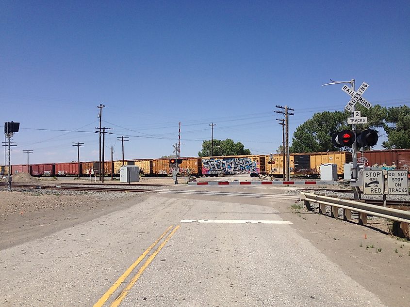 Train crossing Nevada State Route 306 northbound in Beowawe, Nevada.