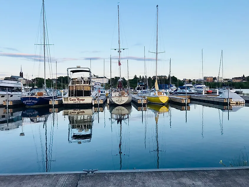 Boats sitting in the Ashland harbor in Ashland, Wisconsin. Image credit Neil Liesenfeld via Shutterstock