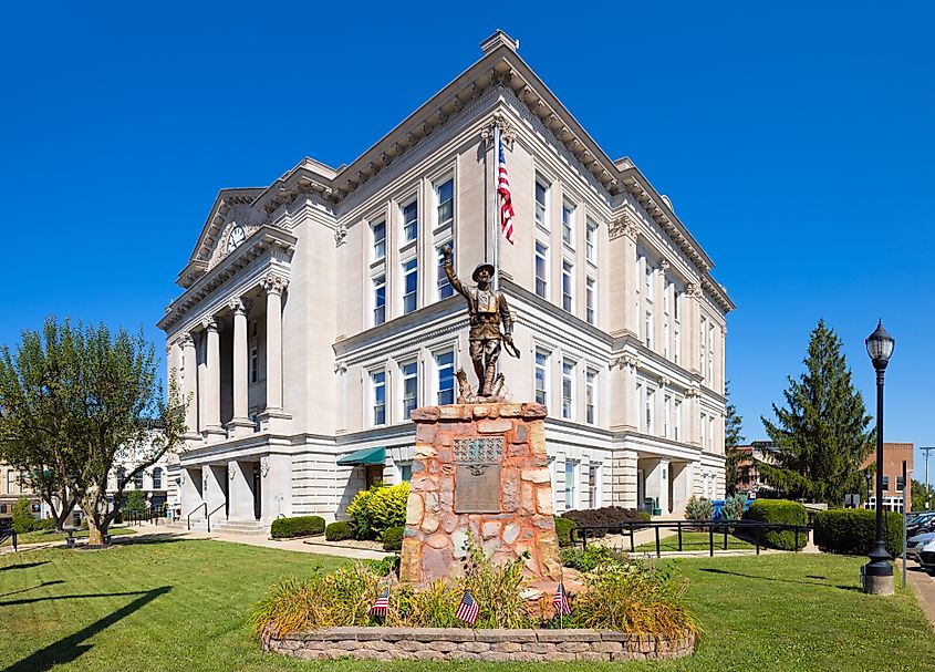 Editorial Photo Credit: Roberto Galan via Shutterstock. Greencastle, Indiana, USA - August 24, 2021: The Putnam County Courthouse and it is War Memorial