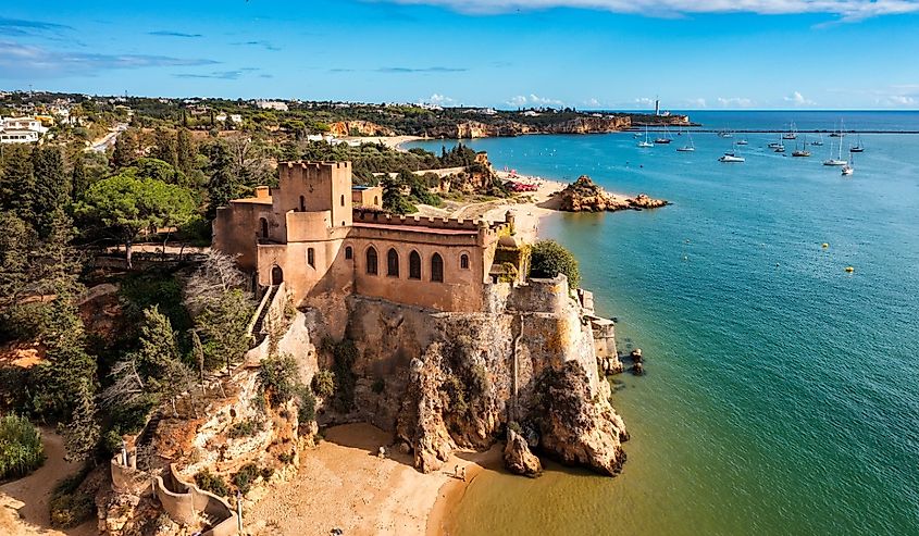 The Fort of Sao Joao do Arade (Castle of Arade) in Ferragudo Village, Algarve. Beach and castle Sao Joao do Arade in Ferragudo in the Algarve in Portugal.