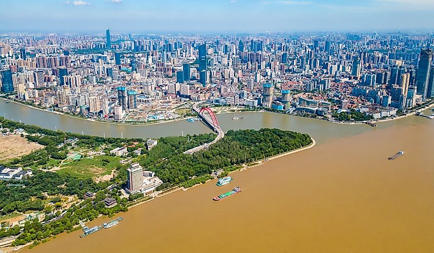 Aerial view of Wuhan skyline and Yangtze river with supertall skyscraper under construction in Wuhan Hubei China.