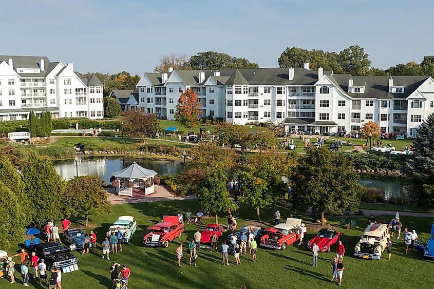 Overview of the Gather on the Green vintage car show on the grounds of The Osthoff Resort in Elkhart Lake, Wisconsin, via ajkelly / Shutterstock.com