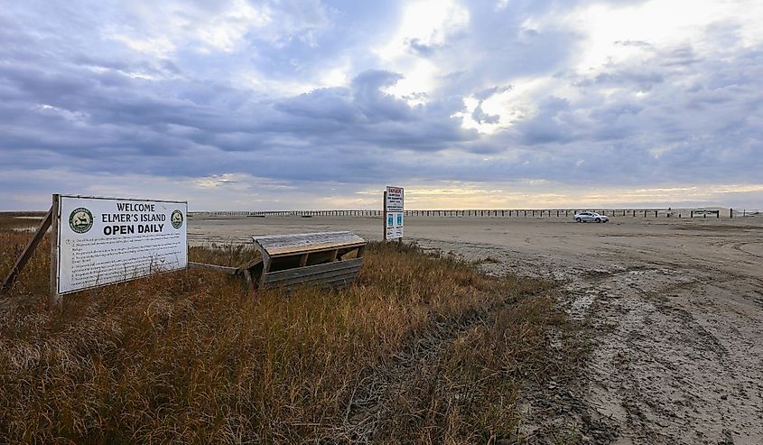 Signs mark the entrance to Elmer's Island Wildlife Refuge in Louisiana.