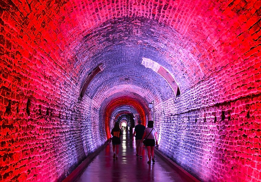 Brockville, Ontario: Tourists walking through the Brockville Railroad Tunnel. Editorial credit: Vintagepix / Shutterstock.com