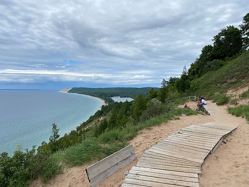 The Empire Bluff Trail viewpoint. The lakes, sandy beaches, massive dunes, greenery, and modest but steady tourist traffic are representative of the Sleeping Bear Dunes National Lakeshore as a whole. 