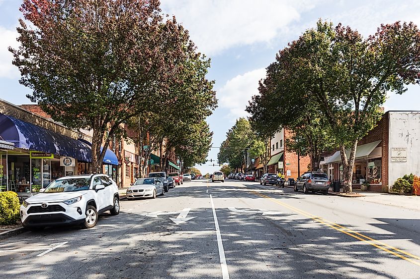 Wide-angle view of Main Street in Brevard, North Carolina, with buildings lining both sides and a clear view down the street.