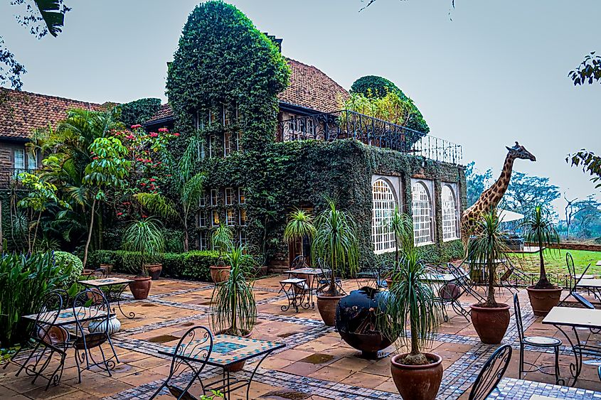 Giraffe Manor, a boutique hotel in Nairobi, Kenya. Image Credit Michael Otis via Shutterstock.