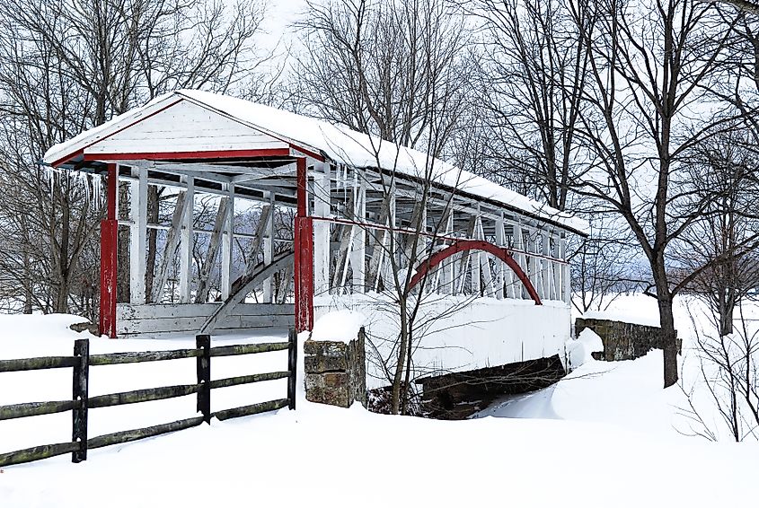 Covered bridge in winter snow in Bedford, Pennsylvania.