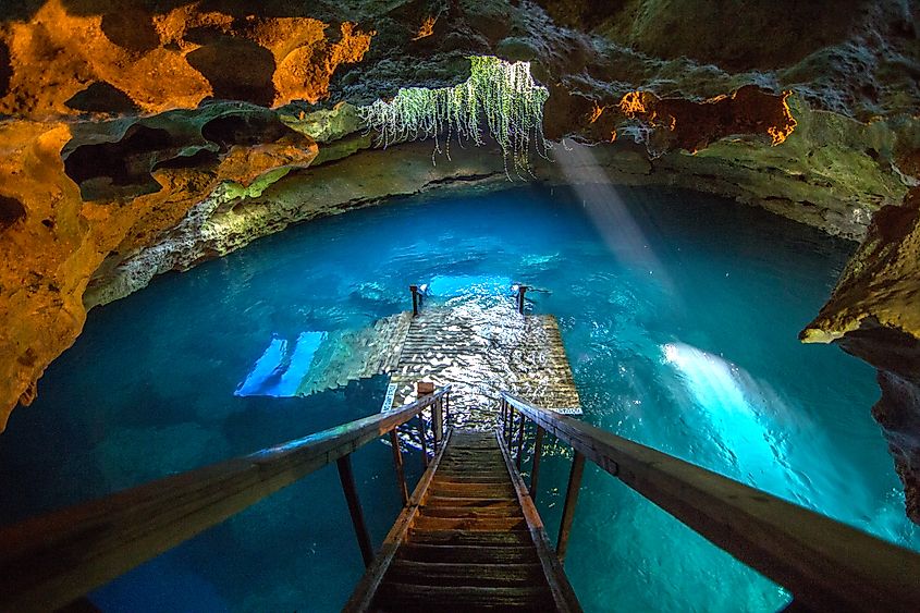 Devil's Den Spring in Florida is a prehistoric underwater cave with crystal-clear waters, offering a glimpse into the region's ancient geological history.