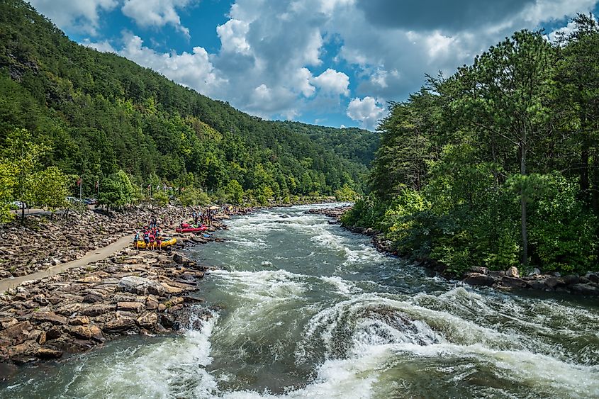 People gathered along the Ocoee River at the Ocoee Whitewater Center in Tennessee