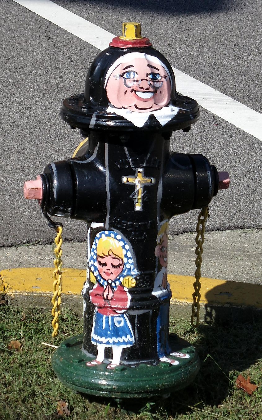 Fire hydrant in front of Immaculate Conception Church painted like a Franciscan nun (Oldenburg, Indiana)