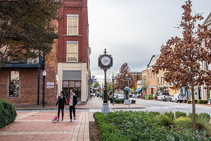 People wander the charming Main Street area downtown. Spartanburg is very scenic. Editorial credit: Page Light Studios / Shutterstock.com