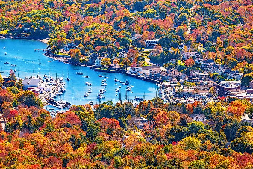 View from Mount Battie overlooking Camden Harbor, Maine, with beautiful New England autumn foliage colors in October.