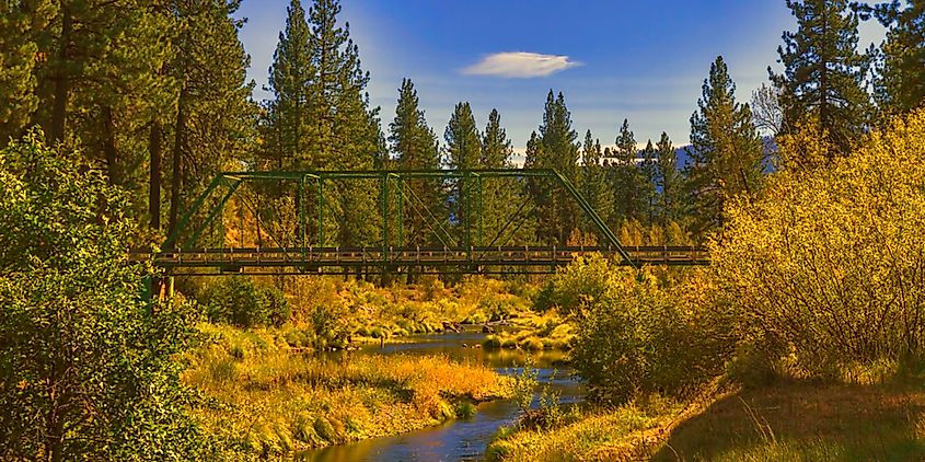 A view of a bridge over the middle fork of the Feather River during fall in California 