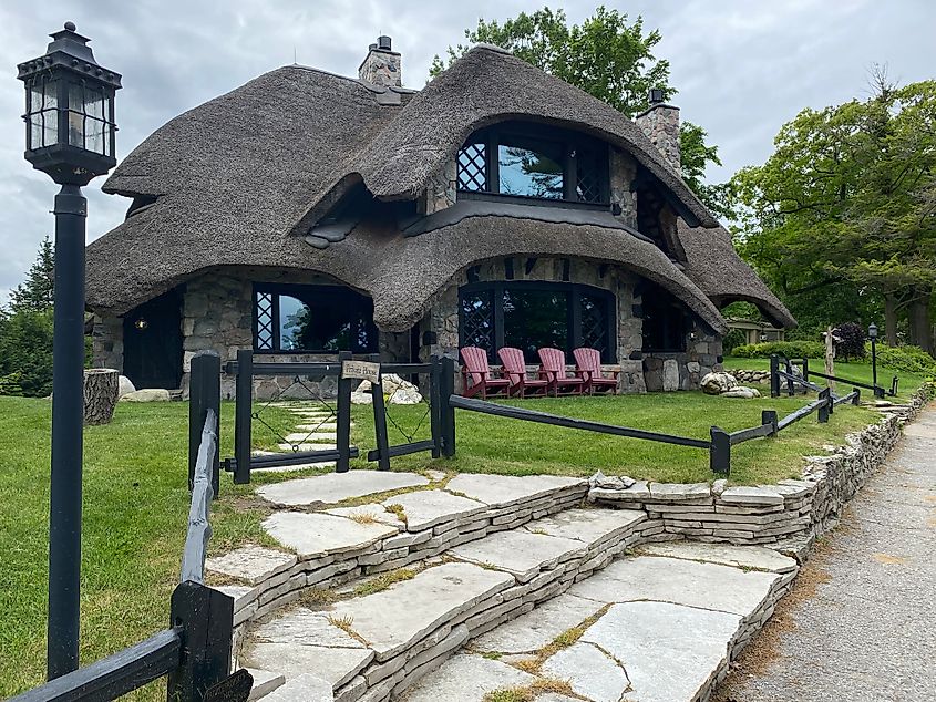 A large, mushroom-like house in the historic district of Charlevoix, Michigan