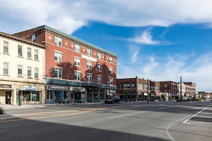 Main Street in Pittsfield, USA, featuring historic houses with classic architectural details.