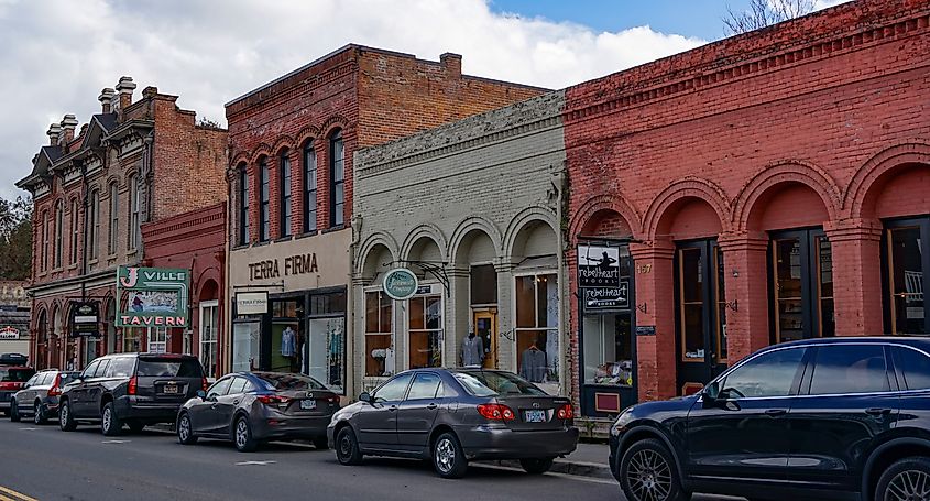 Rustic buildings along a street in Jacksonville, Oregon.