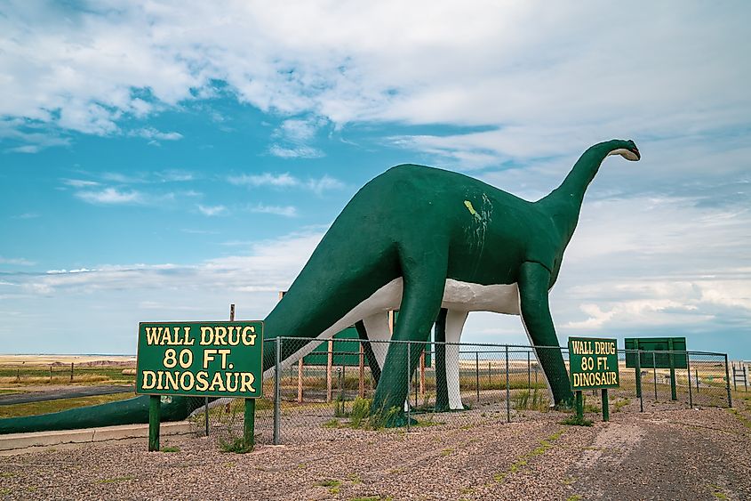 Large 80-foot dinosaur at the entrance of the town of Wall and its famous Wall Drug drugstore. 