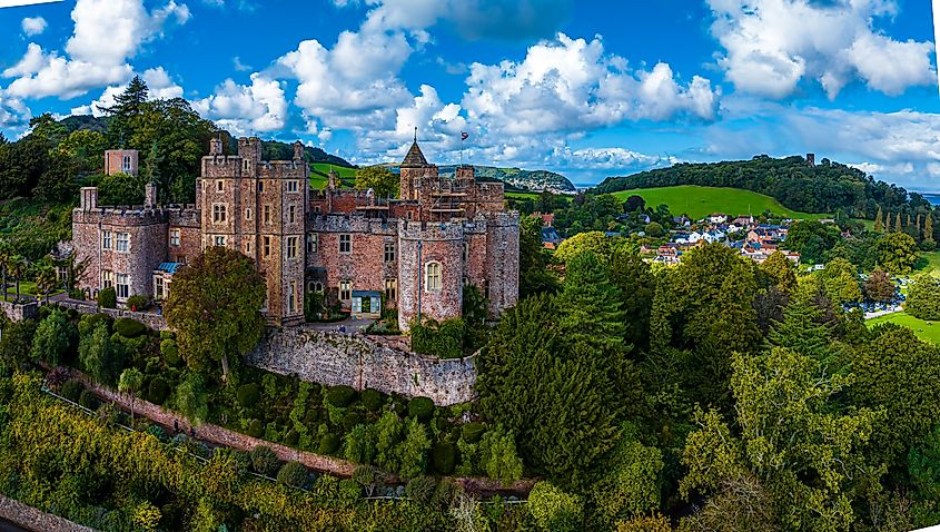 Aerial view of Dunster Castle in Dunster, Somerset, England.
