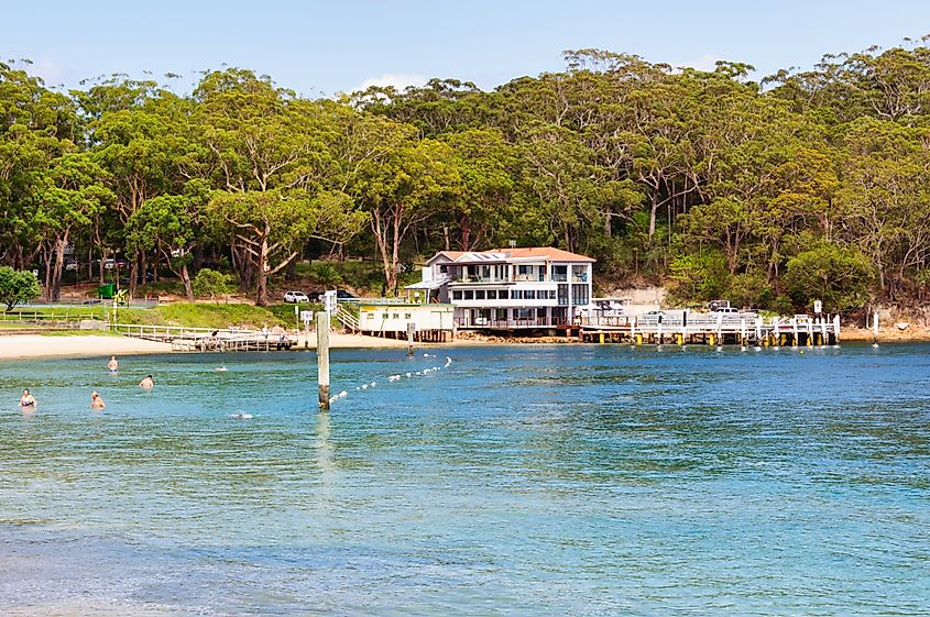 Beach, restaurant, and bar along the Little Beach foreshore in Nelson Bay, NSW, Australia