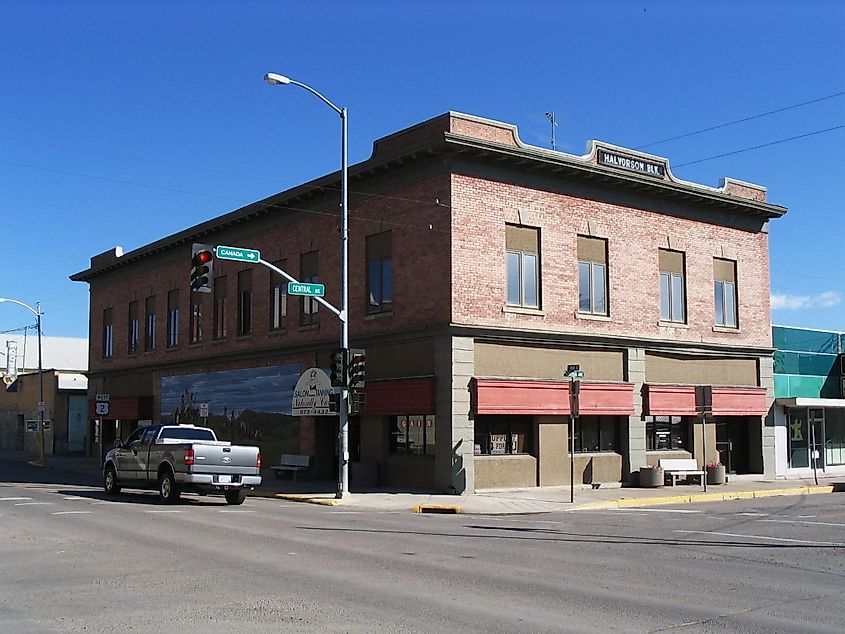 The Halvorson Block, located at the main downtown intersection in Cut Bank, Montana, featuring historic architecture and local businesses.