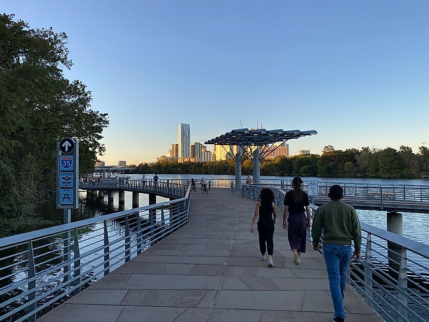 An evening stroll toward downtown along Austin's Boardwalk.