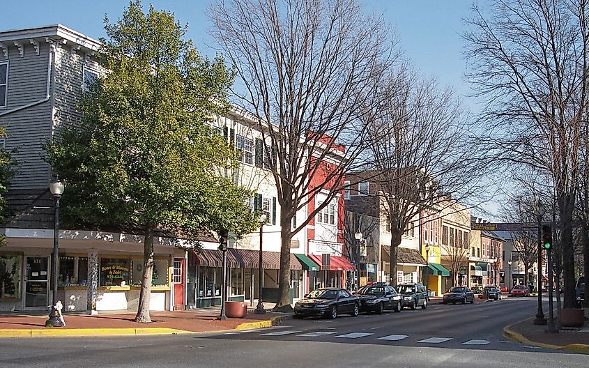 West Loockerman Street in downtown Dover, Delaware, featuring a mix of historic buildings, shops, and local businesses along the bustling street.