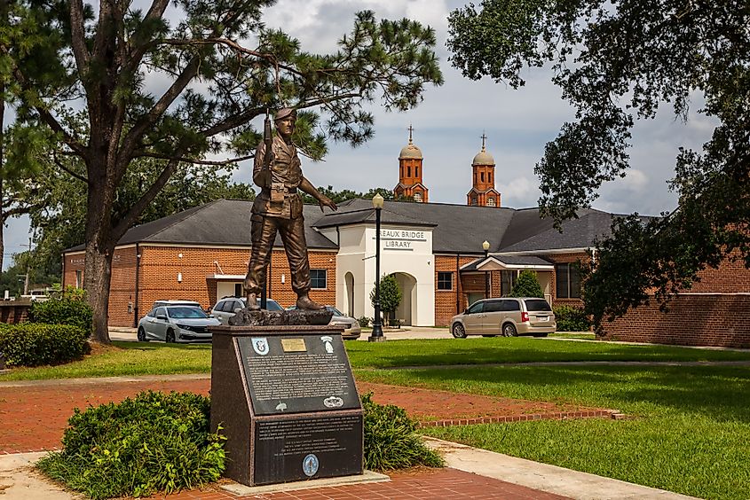 Breaux Bridge, Louisiana, USA - September 8th, 2021: Statue near public library building, installed in honor of the Green Berets, highly skilled and motivated veterans, became part of the U.S. Army.