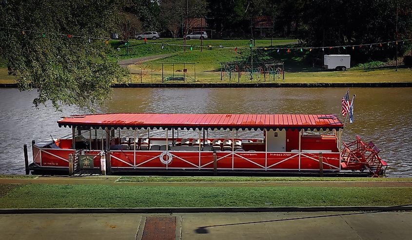 Natchitoches, Louisiana United States, a boat on the Cane River below the town strip